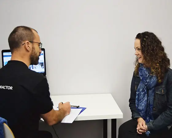 Chiropractor and patient